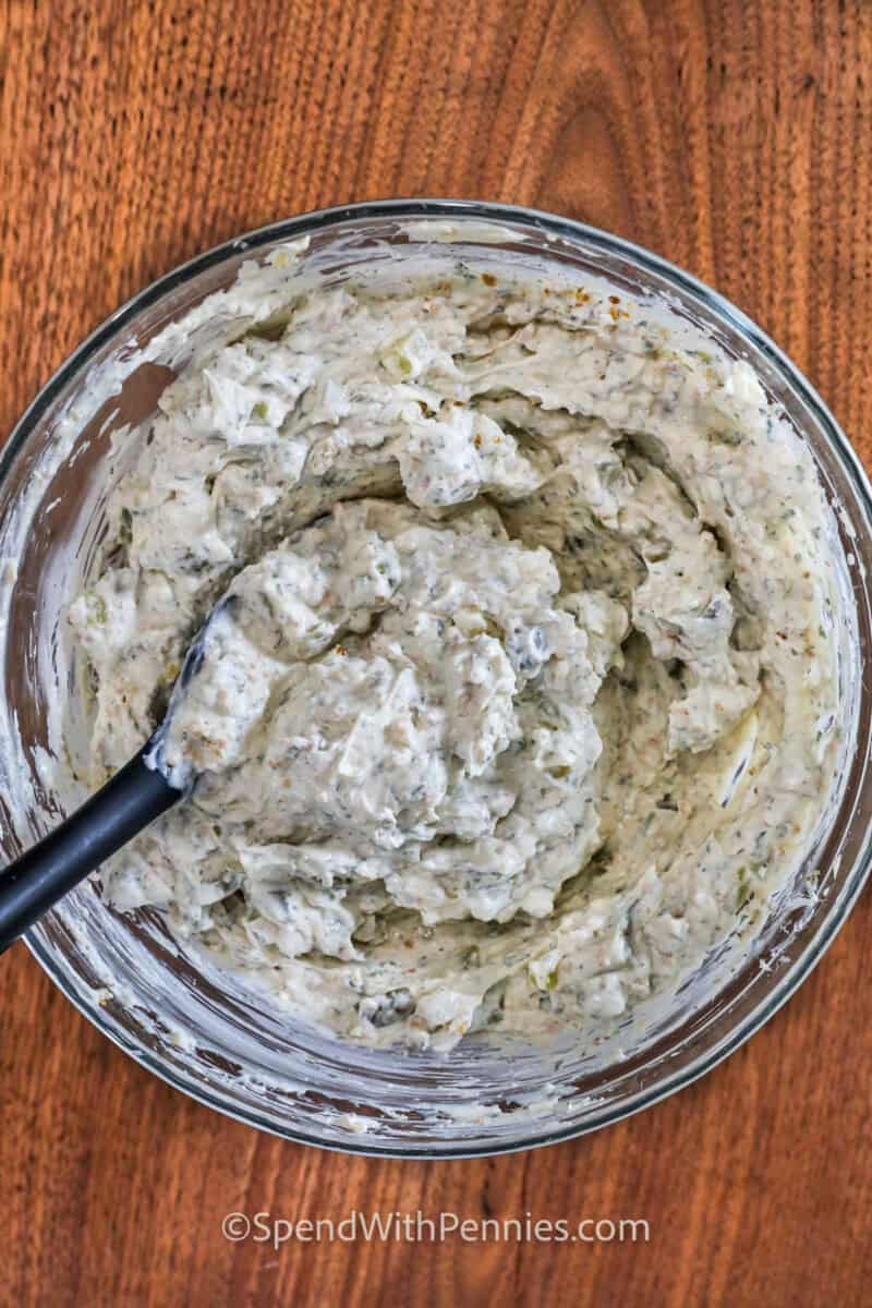 Fried Pickle Dip ingredients mixed in a bowl