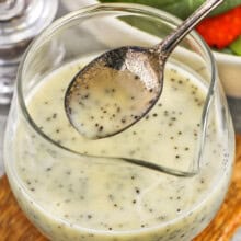 jar of Poppy Seed Dressing with a spoon