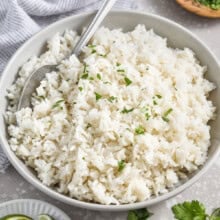 Coconut Rice in a bowl with a spoon