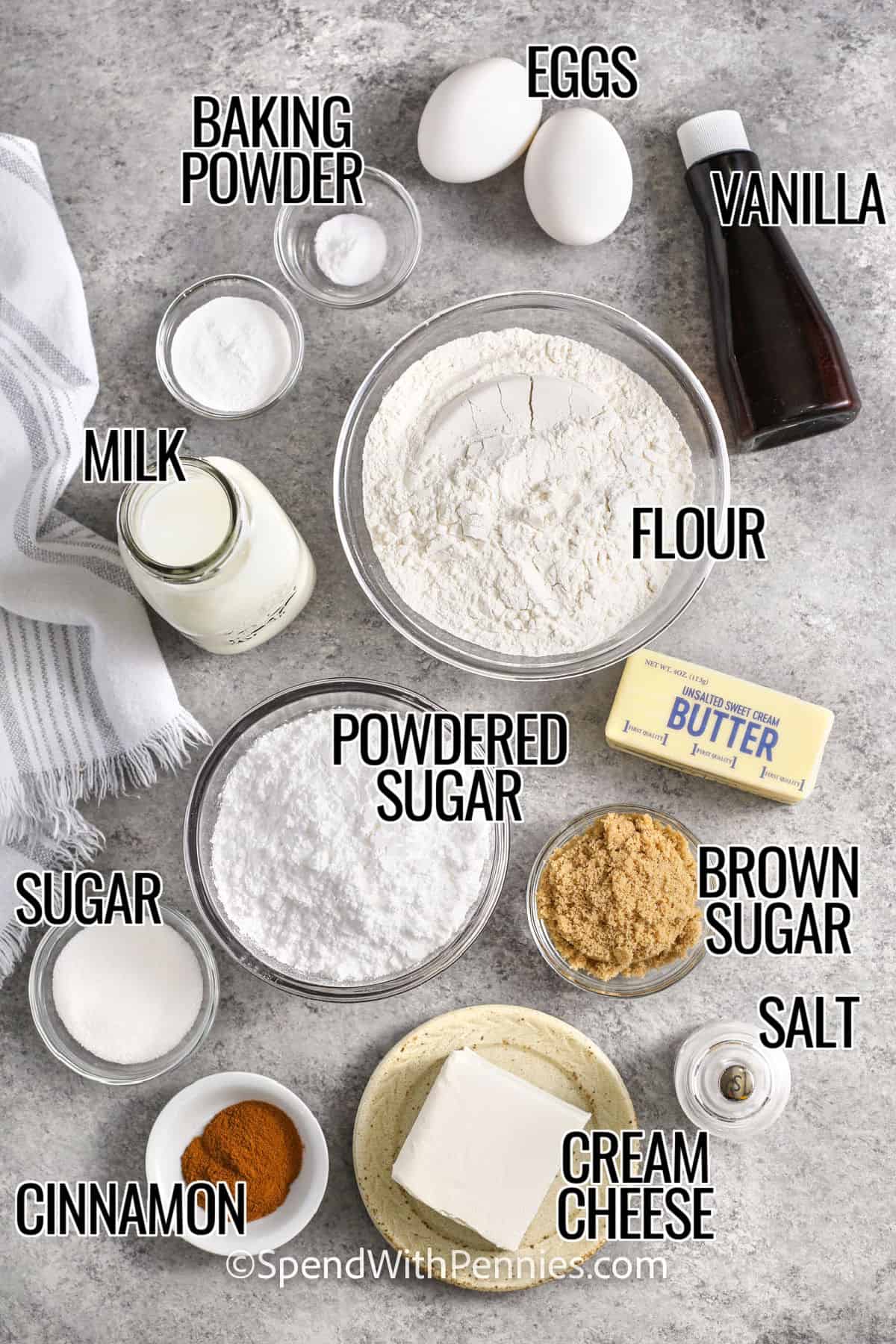 baking powder , eggs , vanilla , flour , milk , butter , powdered sugar , brown sugar , salt , sugar , cream cheese , cinnamon with labels to make Cinnamon Roll Pancakes