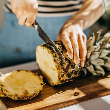 Cutting a pineapple