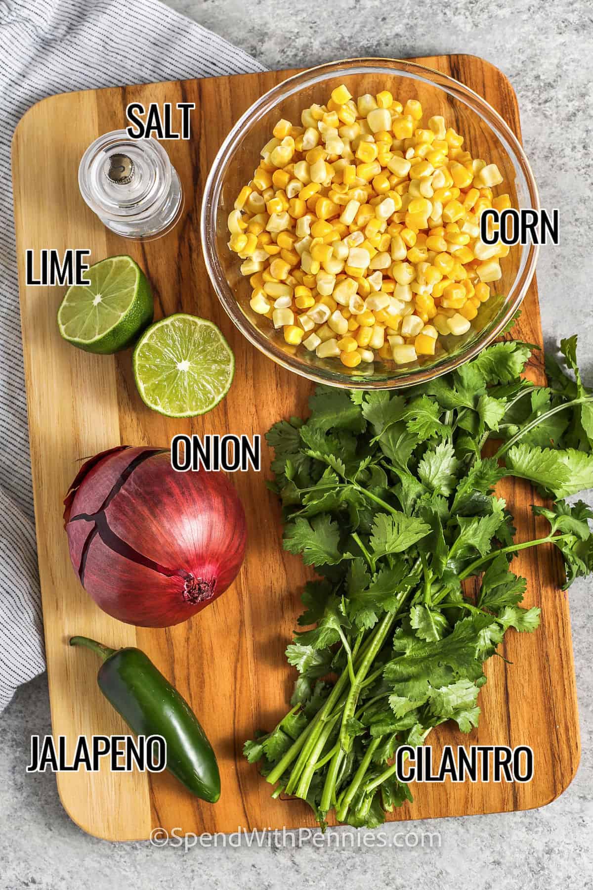 salt , corn , lime , onion , jalapeno , cilantro with labels to make Corn Salsa