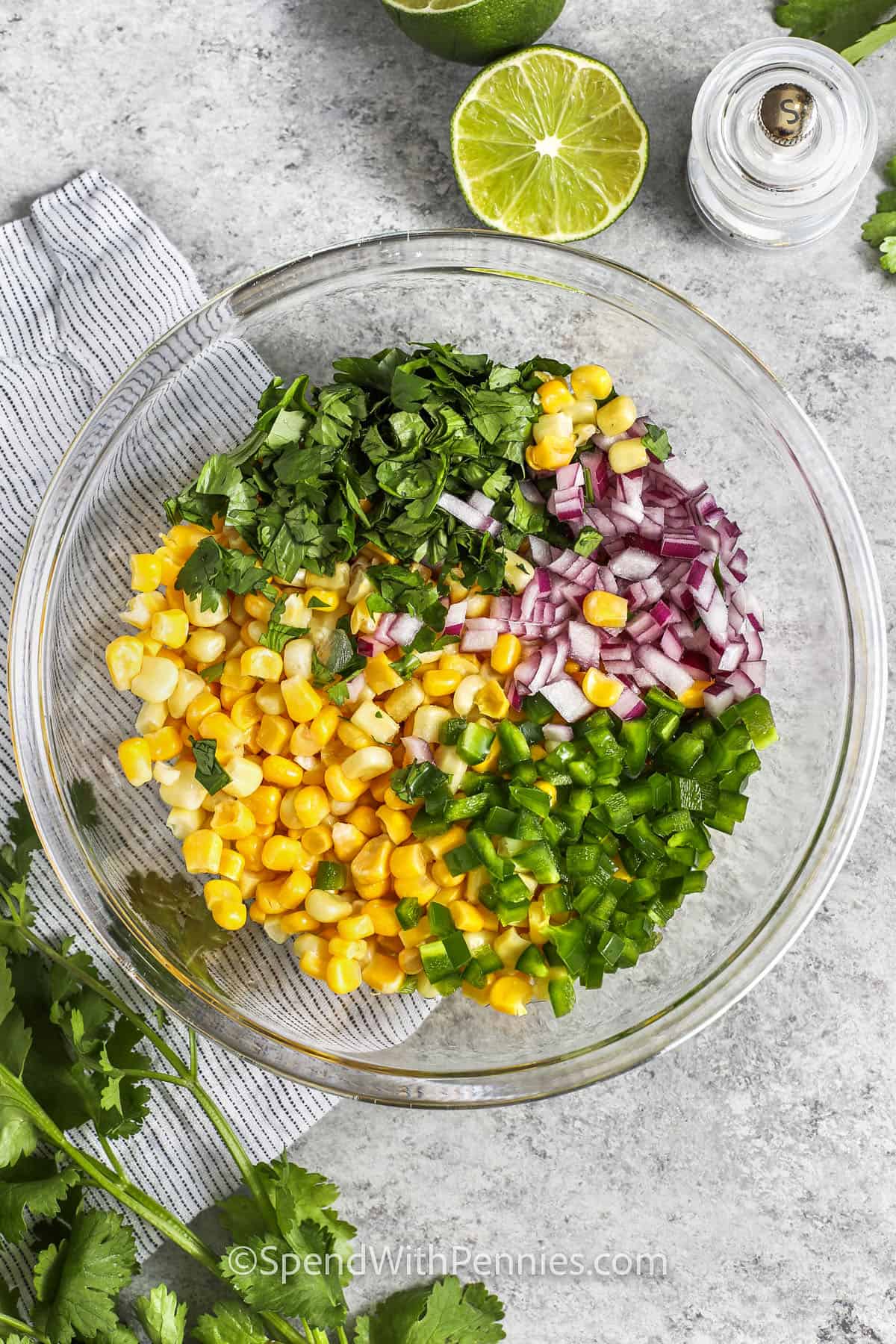 adding ingredients to bowl to make Corn Salsa