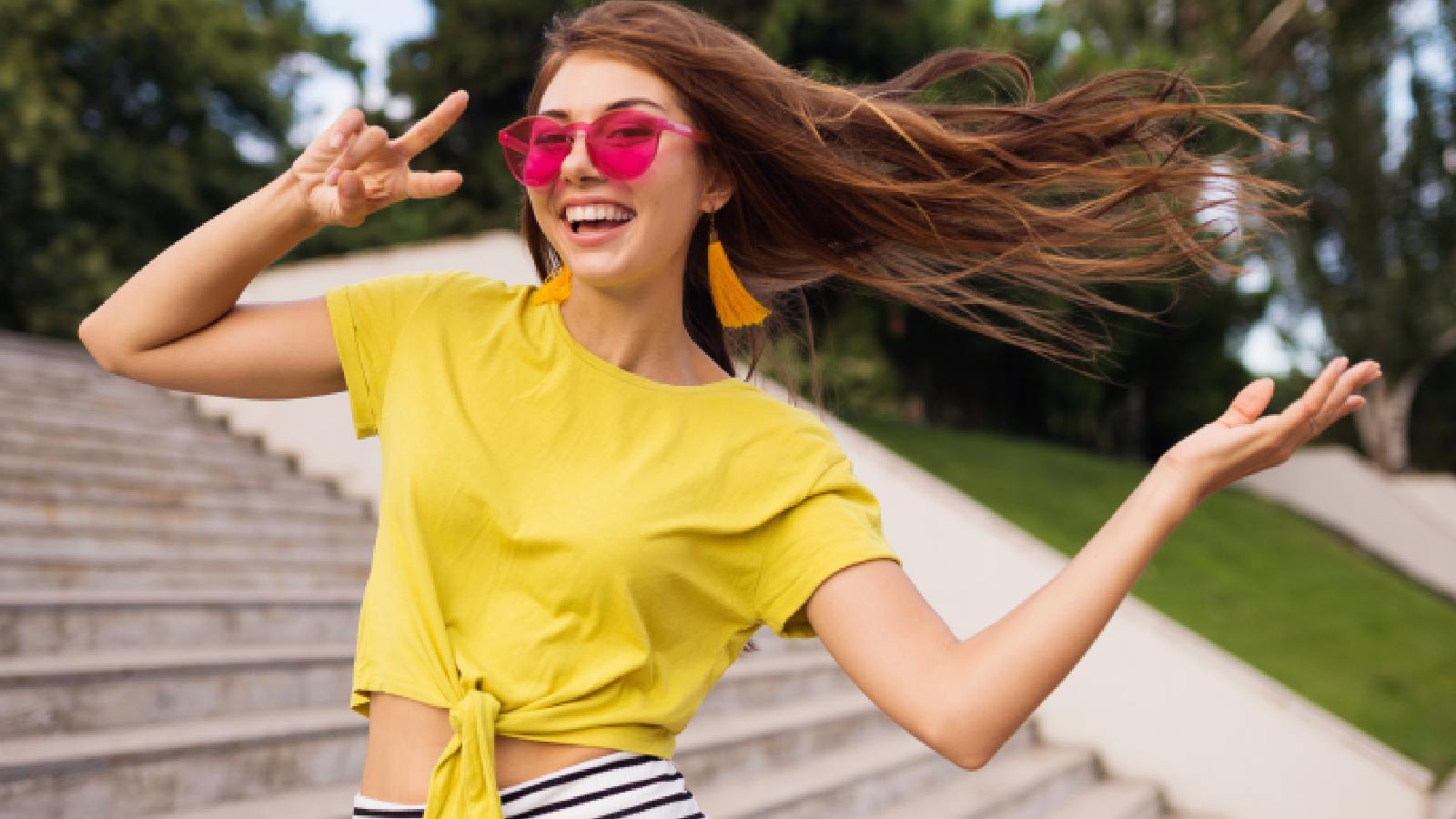 A woman enjoying the sun after applying fish oil for hair