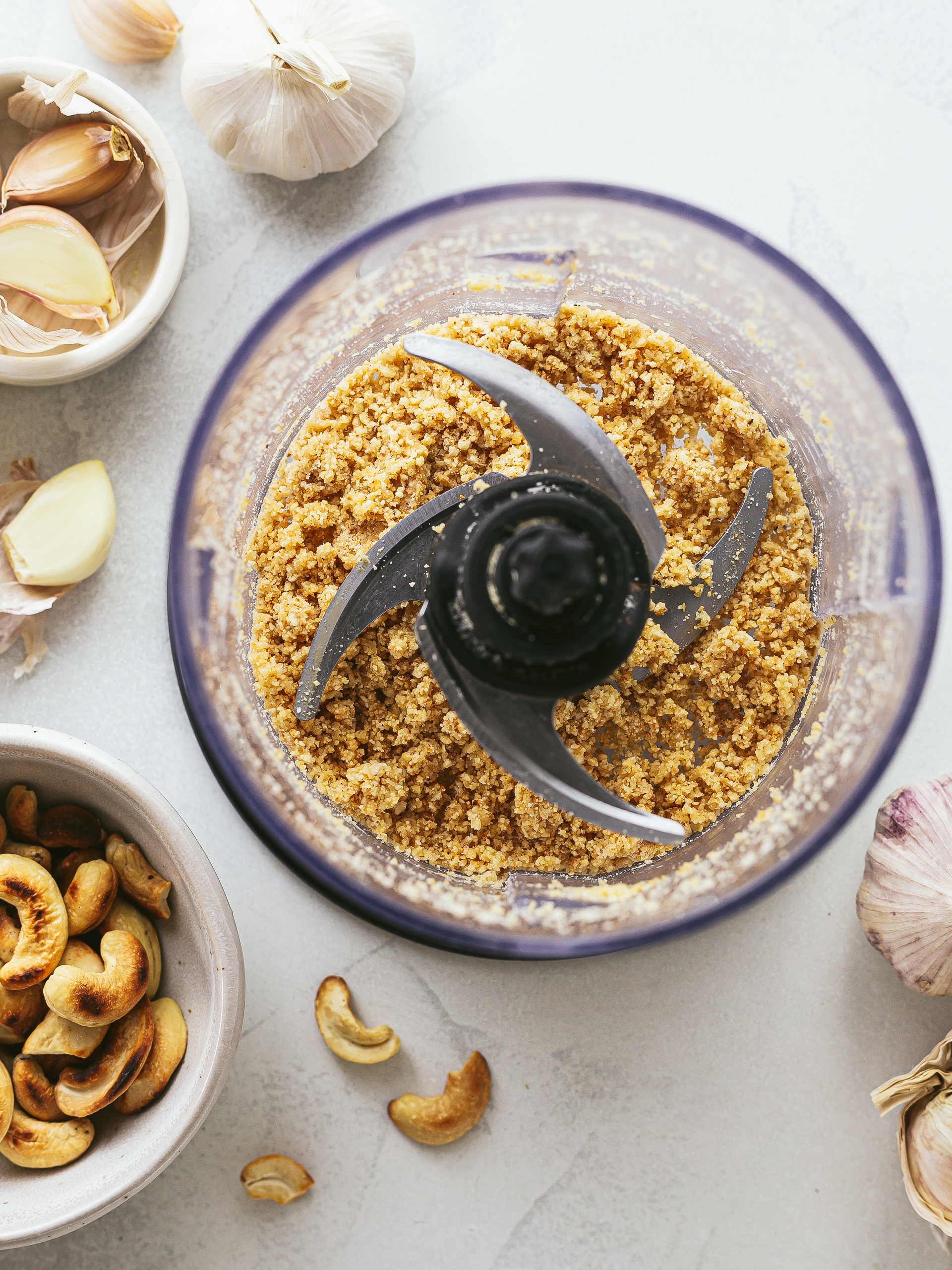 cashews and garlic blended in a food processor for pesto