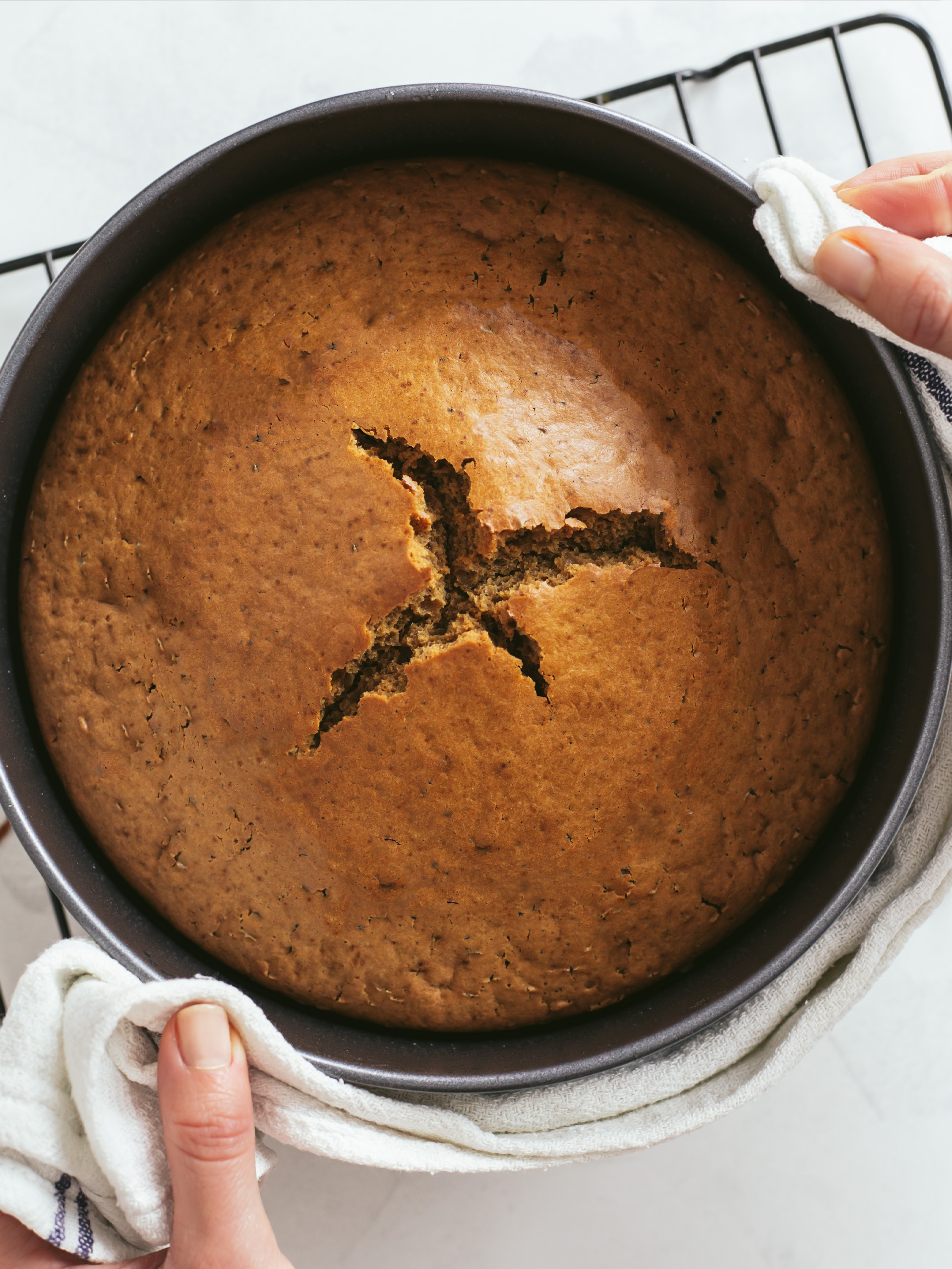 baked masala chai cake in a cake tin