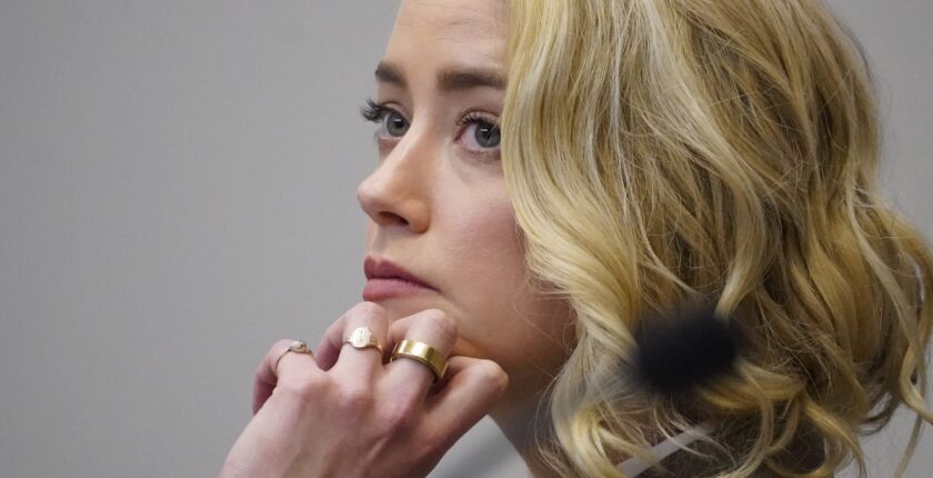 Actor Amber Heard listens in the courtroom at the Fairfax County Circuit Courthouse in Fairfax, Virginia, on May 23, 2022.