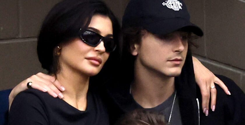 Kylie Jenner and actor TimothÃ©e Chalamet look on during the Men