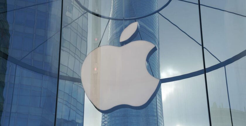 The Apple logo is shown on a store in China